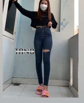 Quần jeans dài giãn ống ôm xanh đậm dơ(xanh bụi) rách 1 bên đùi lai cắt.