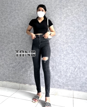 Quần jeans giãn ống ôm màu xám rách 1 bên đùi,lai cắt