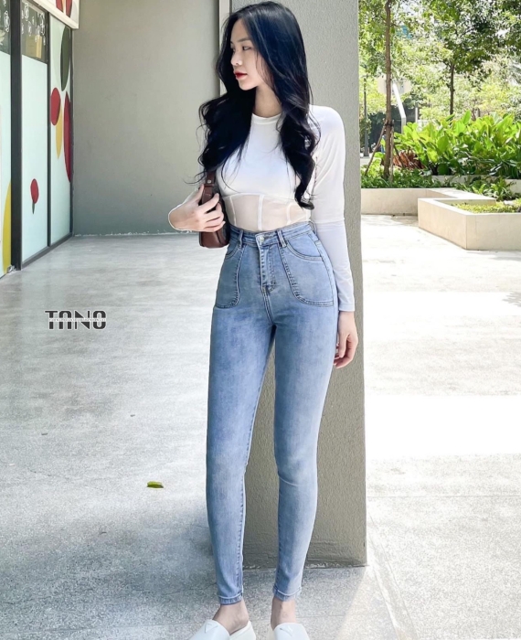 Quần jeans dài giãn ống ôm lai cuốn túi đóng