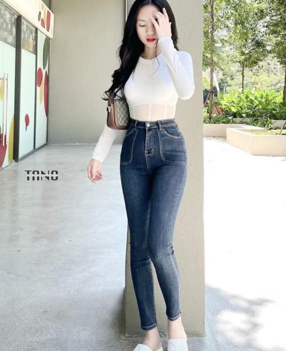 Quần jeans dài giãn ống ôm lai cuốn túi đóng
