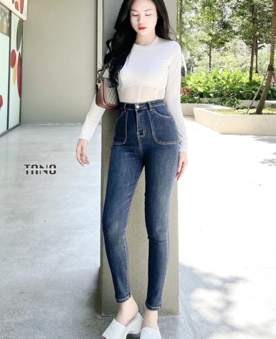 Quần jeans dài giãn ống ôm lai cuốn túi đóng
