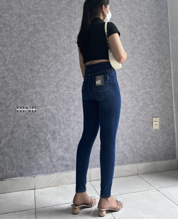 Quần jeans giãn ống ôm màu xanh đậm,2 nút bóp.